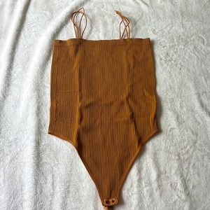 Orange/brown bodysuit
